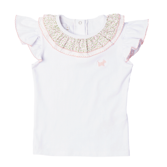 Girls white polo with ruffle sleeve and floral print ruffle collar by Sal and Pimenta. 