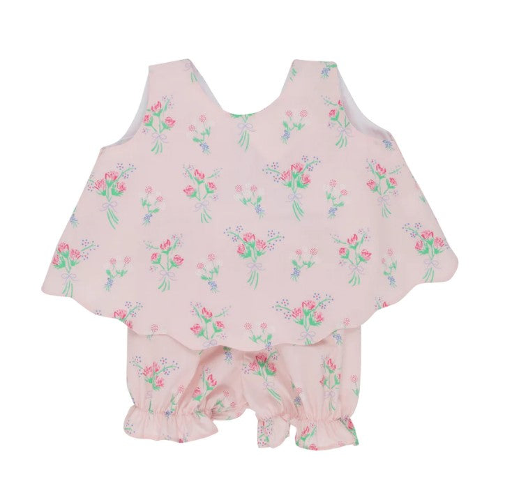 Pale pink toddler blouse with in a floral print with a matching bloomer and large blue bow accent by The Beaufort Bonnet Company.
