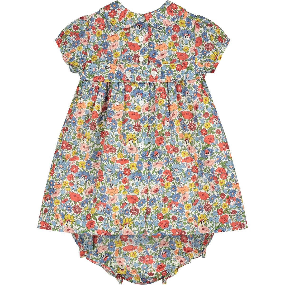 Eris Smocked Baby dress with heart buttons and matching floral bloomers. 