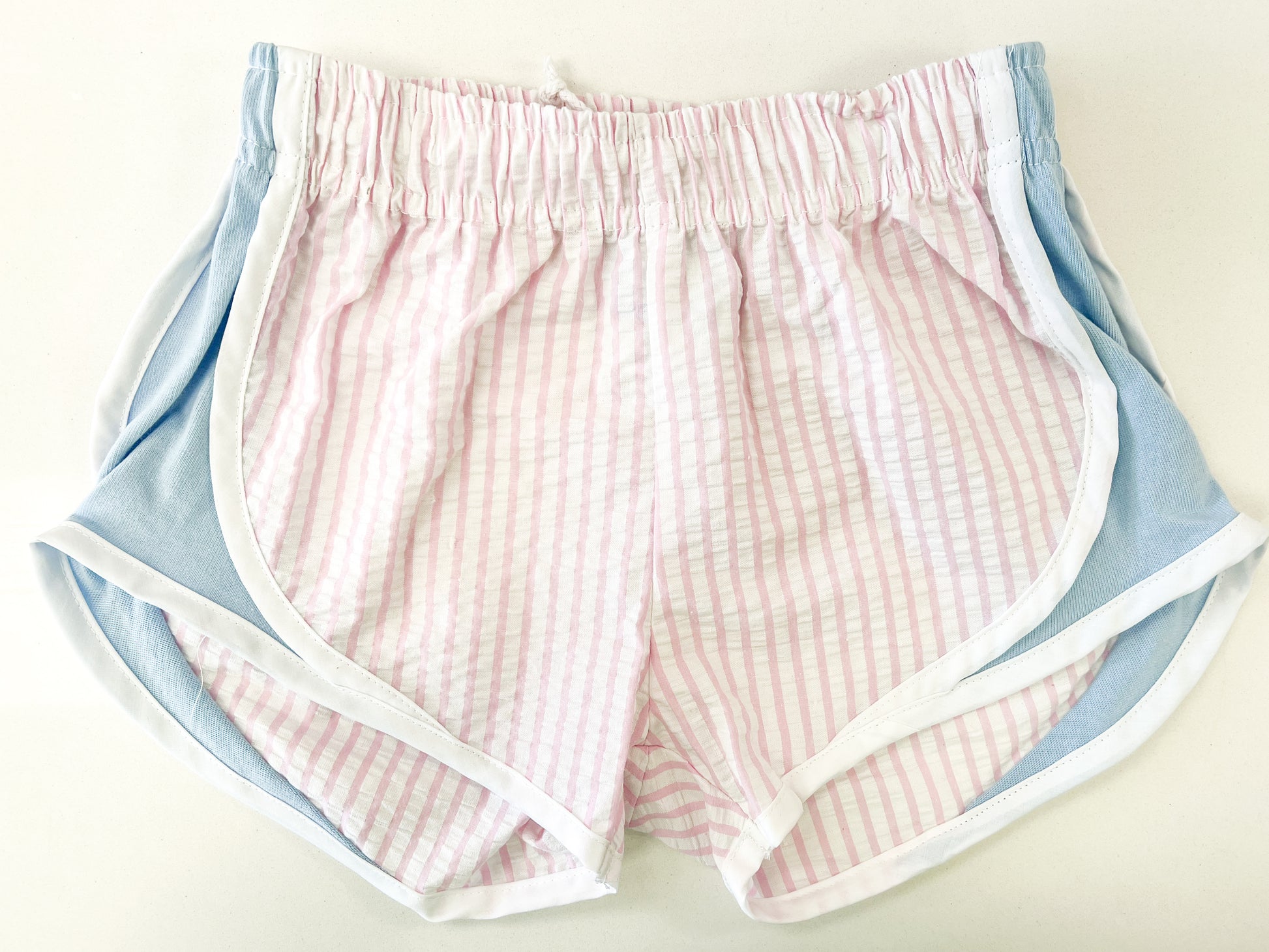 Pink stripe and blue girls active shorts. 