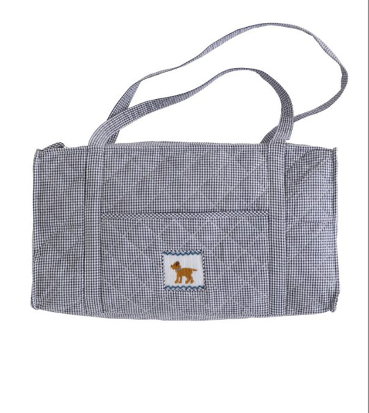 Navy blue check duffle with smocked dog print by Little English. 
